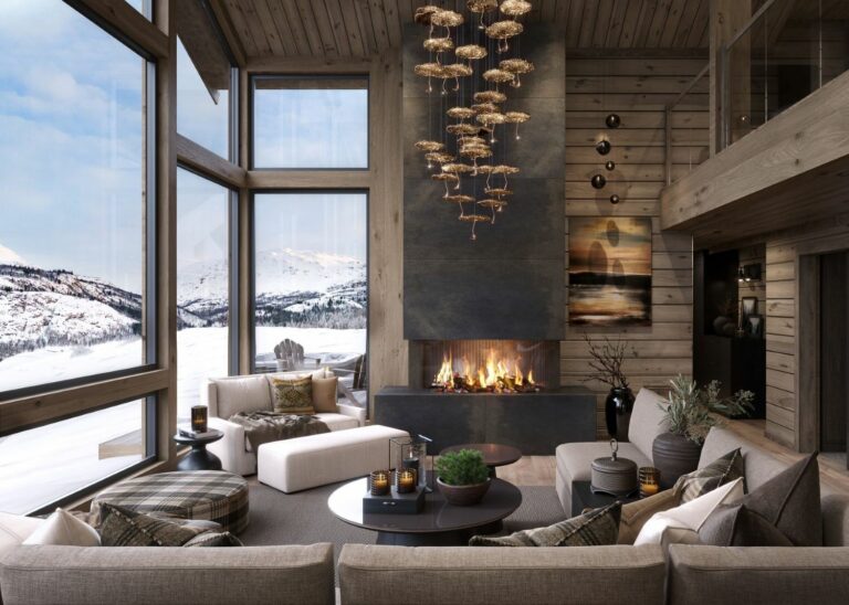03. Stua innbyr til sosial hygge omgitt av flammene fra peisen og naturen utenfor. Fritidsbolig – Hytte TTH Kvitfjell 222.