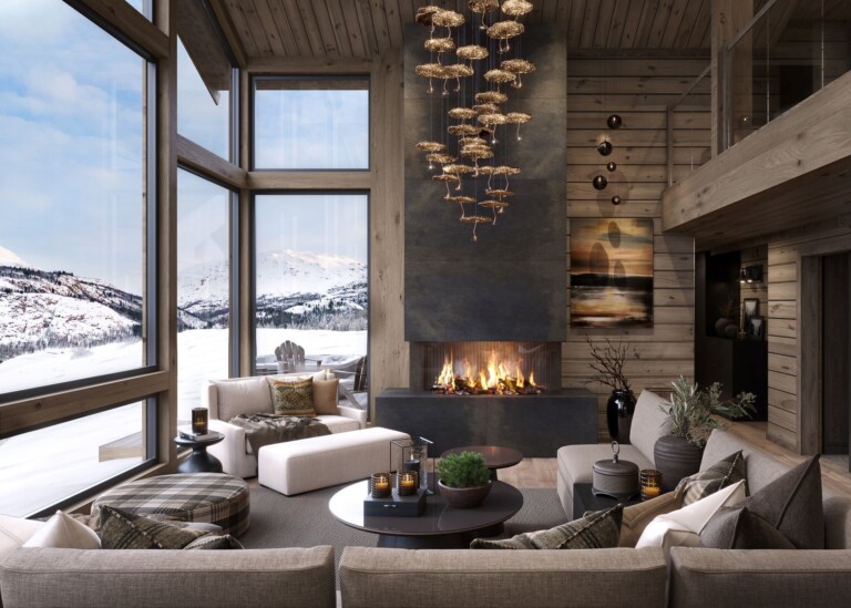 03. Stua innbyr til sosial hygge omgitt av flammene fra peisen og naturen utenfor. Hytteinteriør Hytte TTH Kvitfjell 222