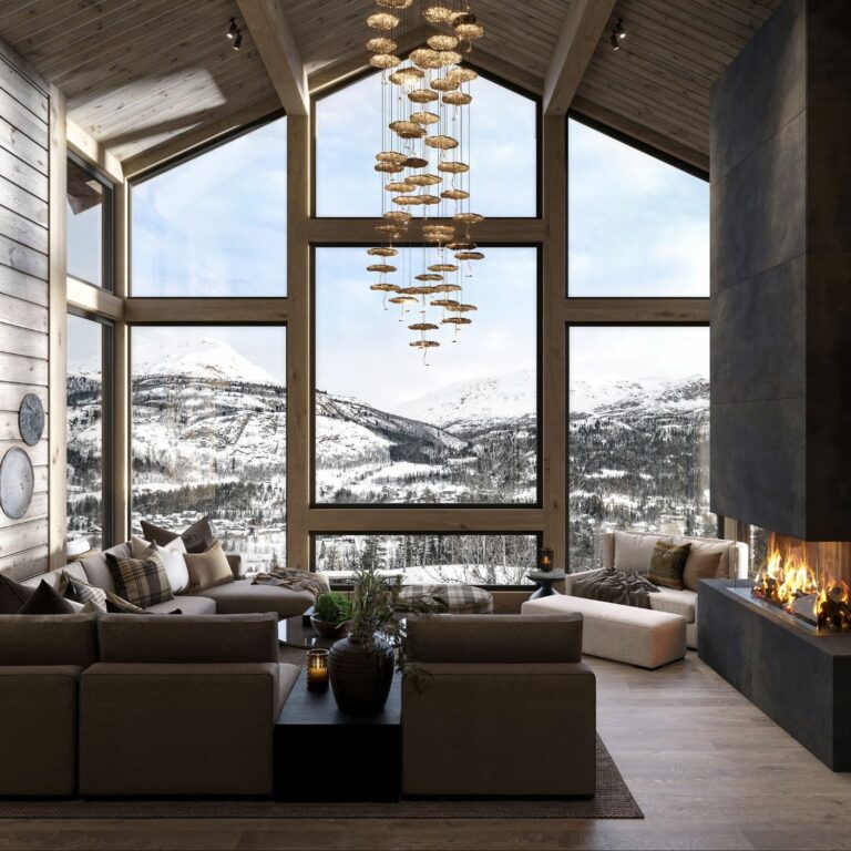 04. Fjellpanorama møter deg gjennom den høye glasskledde gavelveggen i front. Fritidsbolig- Hytte TTH Kvitfjell 222.
