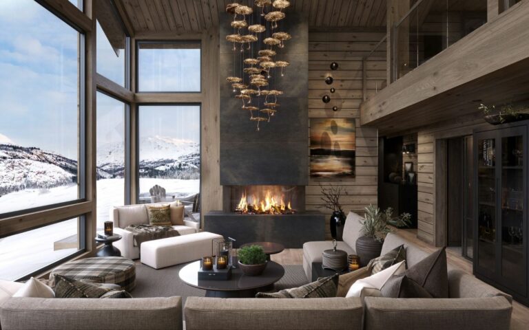 38. Stua innbyr til sosial hygge omgitt av flammene fra peisen og naturen utenfor. Fritidsbolig – Hytte TTH Kvitfjell 222.