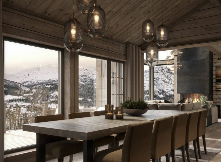 54. Store vindusflater ved spisebordet bringer fjellnaturen inn til måltidene. Fritidsbolig – Hytte TTH Kvitfjell 222.