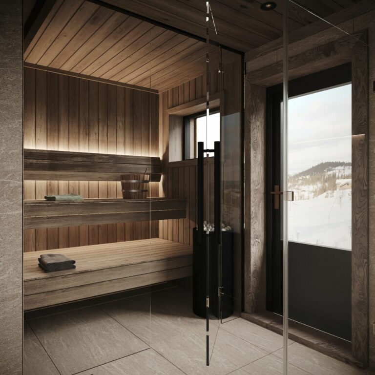 82. Badstuas glassfront nær balkongdøra og vindu sikrer at du kan nyte fjellnaturens i badstua. TTH Kvitfjell 218.